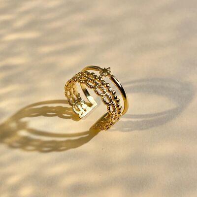 Bague motif étoile centrale ajourée réglable en acier