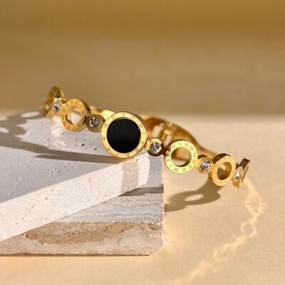 Bracciale rigido in acciaio inossidabile placcato oro con medaglione rotondo nero