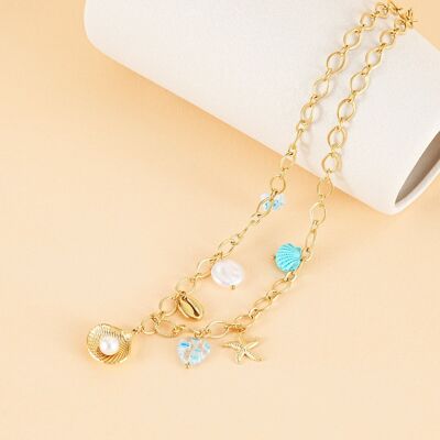 Gold chain necklace with blue sea charms