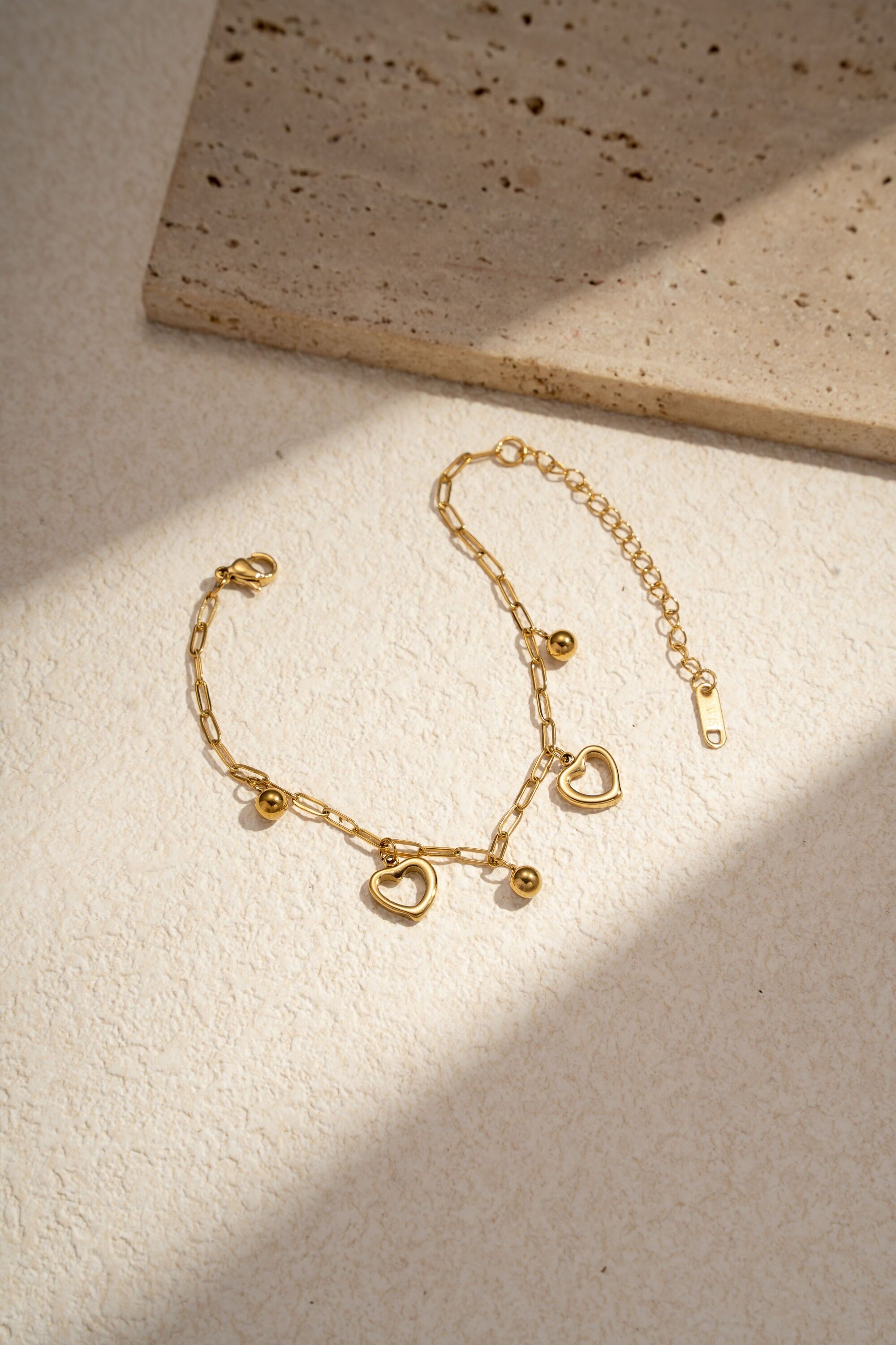 Pulsera de acero inoxidable con dije de corazón