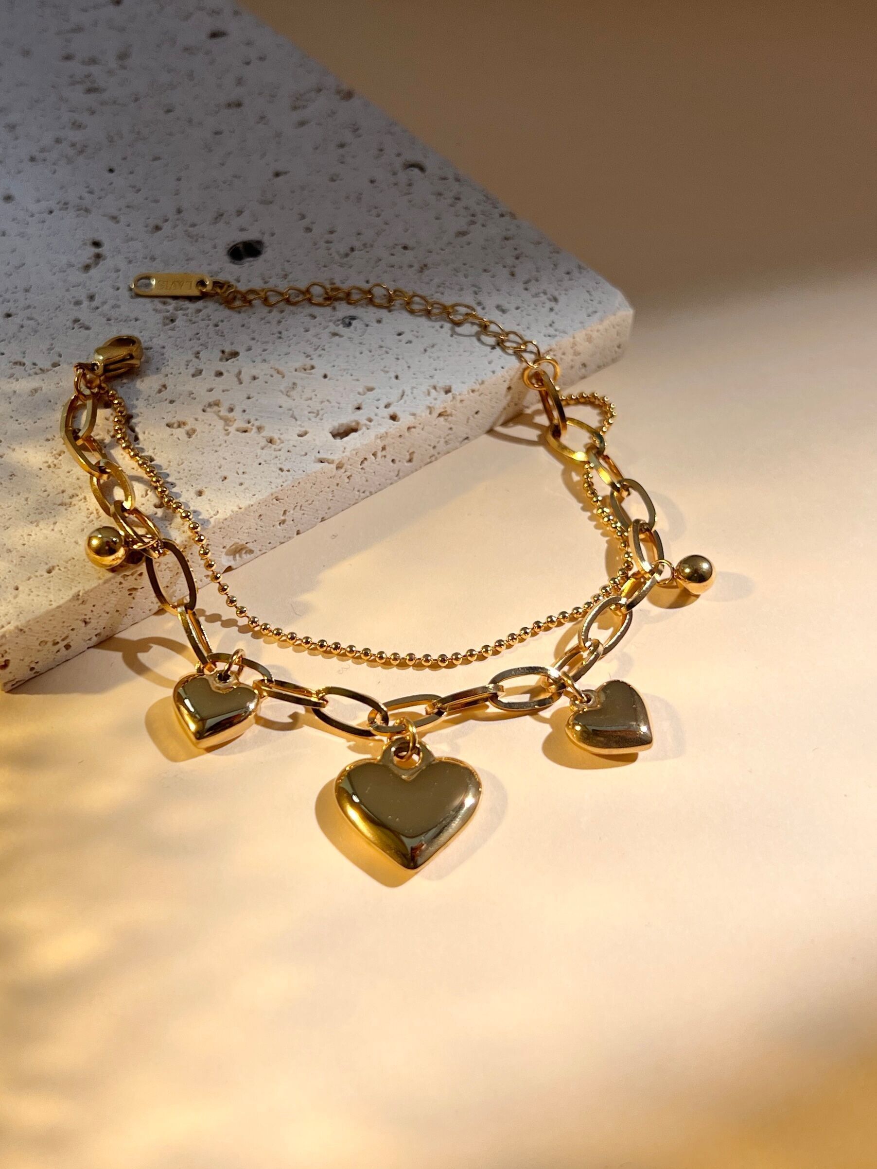 Double wrap bracelet with wide links and heart charm