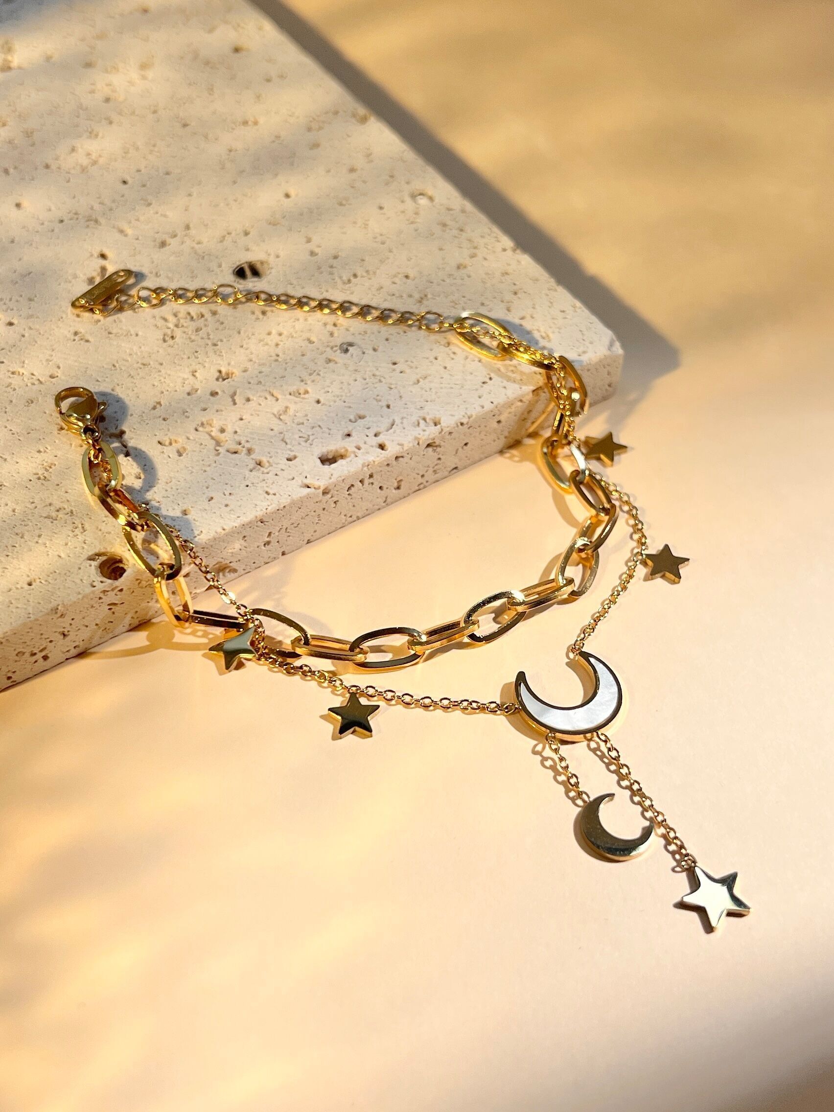 Double wrap bracelet with pearly moon and star charms