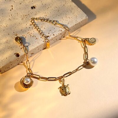 Shell, starfish and pearl charm bracelet