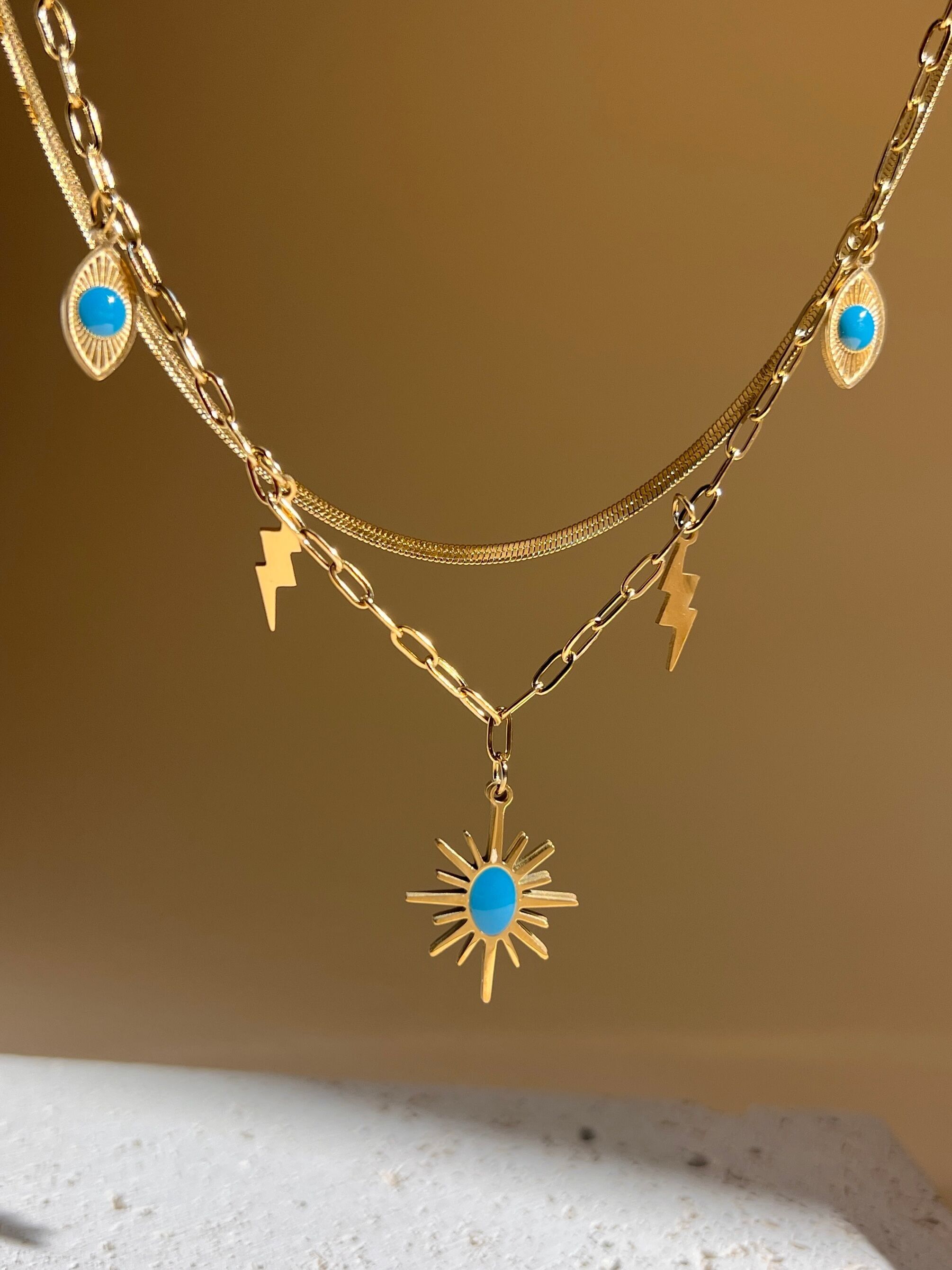 Gold-plated stainless steel necklace with blue enamelled star pendant