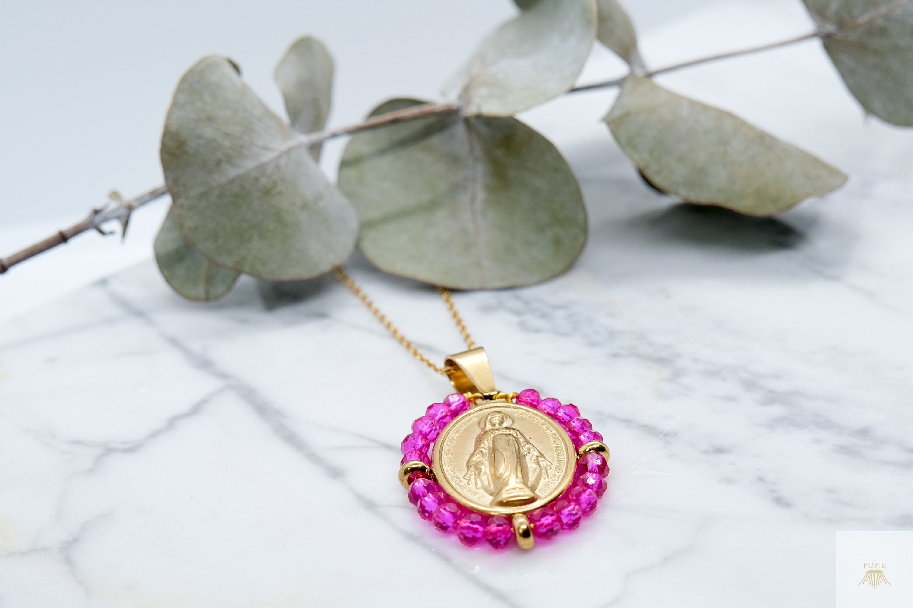 Our Lady stainless steel necklace surrounded by fuchsia pink pearls
