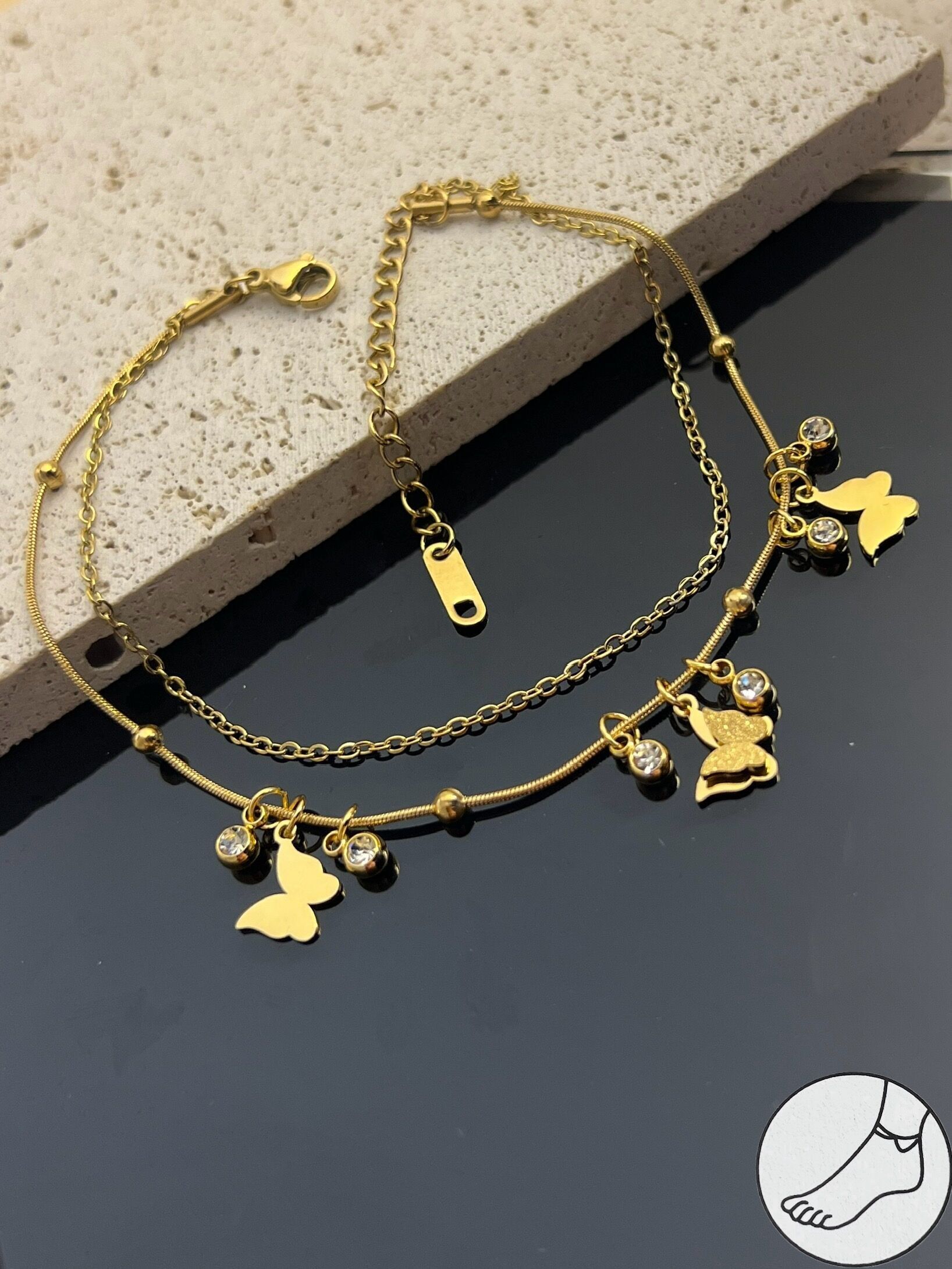 Tobillera de acero inoxidable con dijes de mariposa