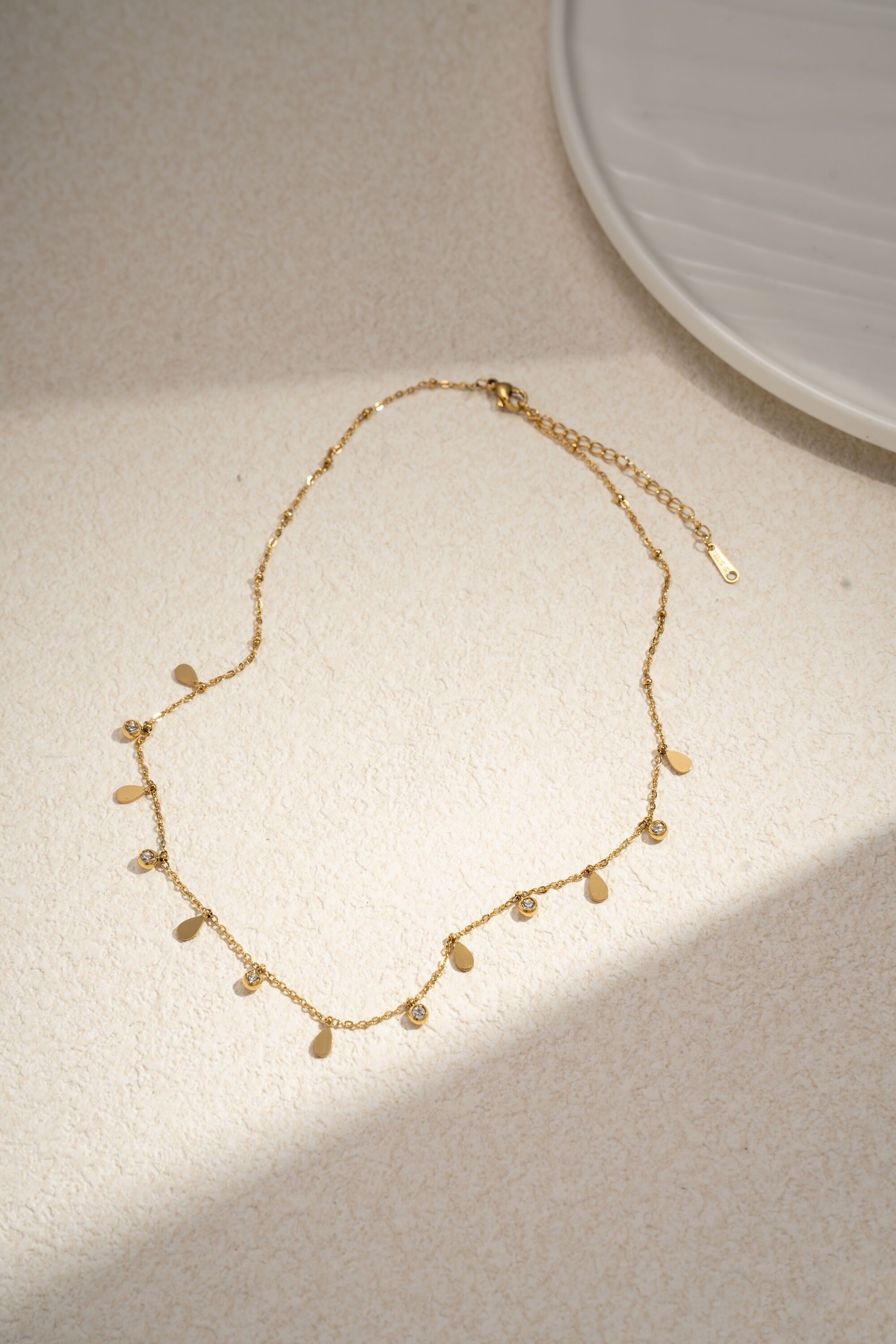 Collar con borla pequeña en acero inoxidable