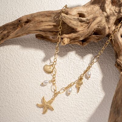 Collar con dije de estrella de mar y concha en acero