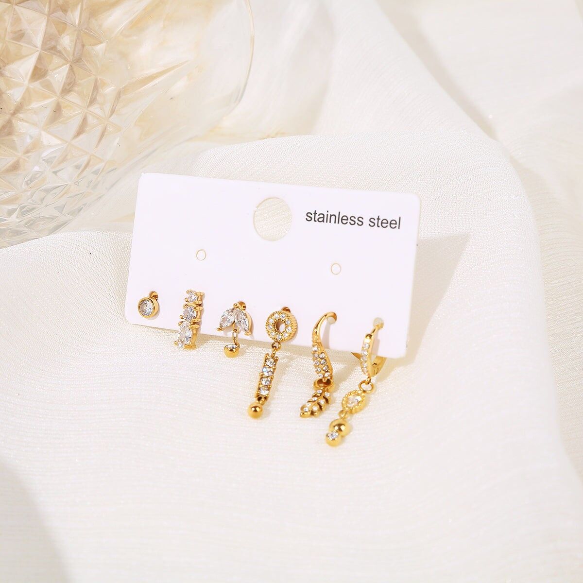 Set di 6 orecchini unici in foglia d'oro