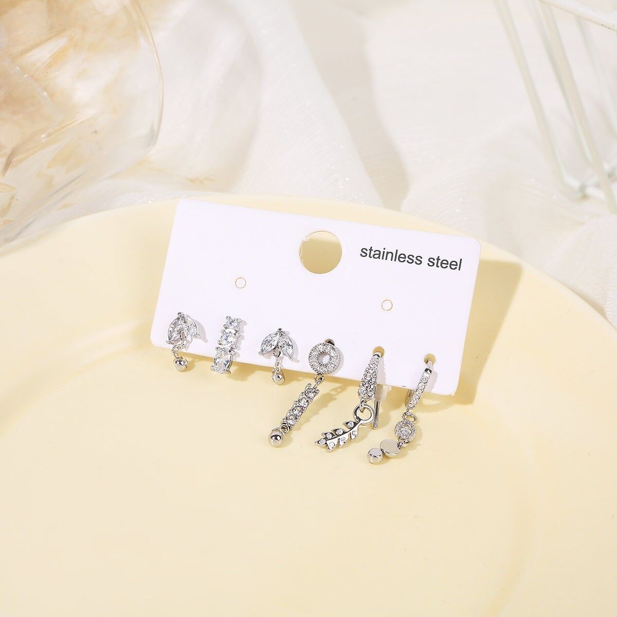 Set di 6 orecchini unici in foglia d'argento