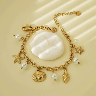 Gold chain bracelet with shell, starfish and pearl charms