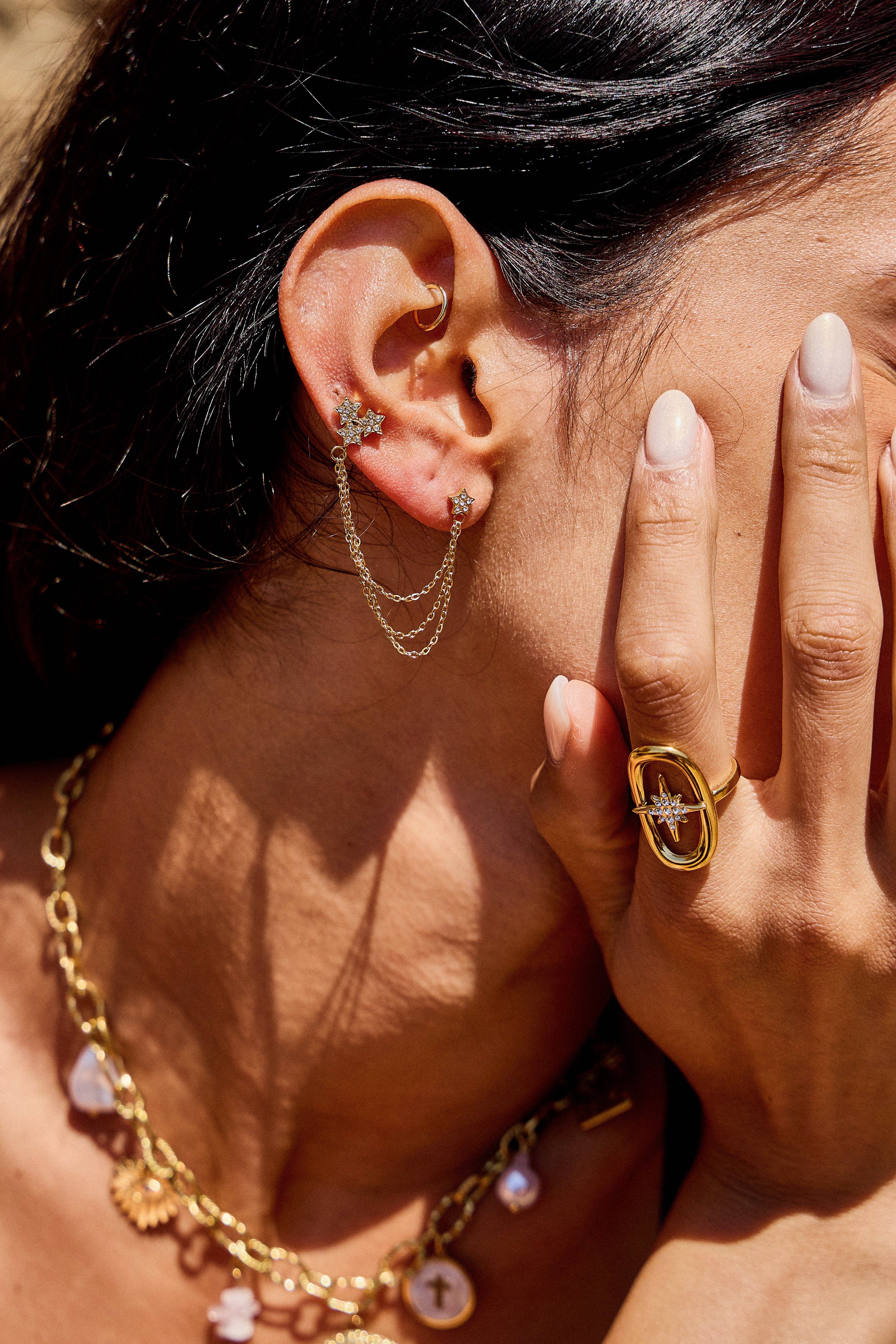 Mono boucle d'oreille étoile chaîne en acier inoxydable doré – Bijou tendance et original