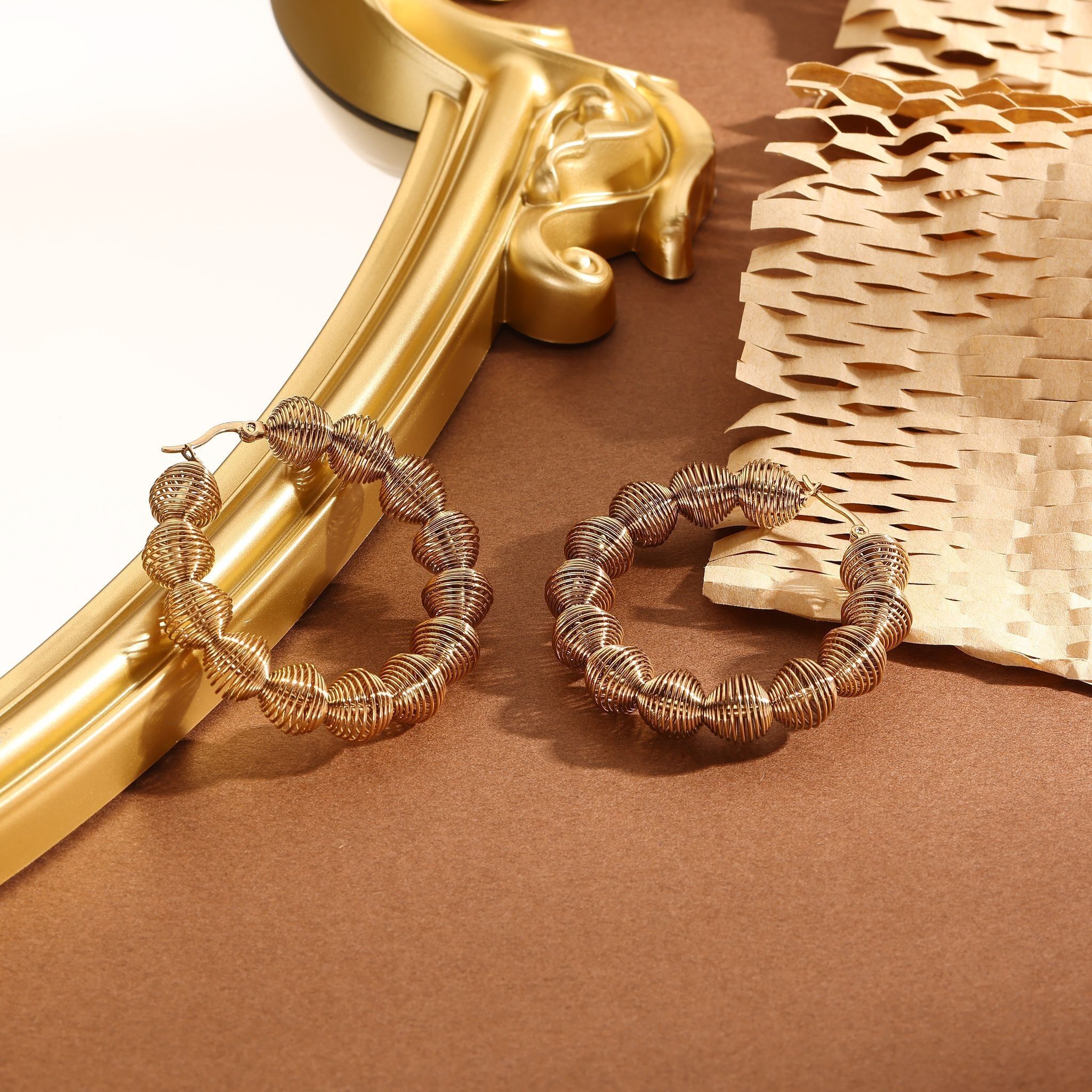 Orecchini a cerchio ondulati spessi in oro