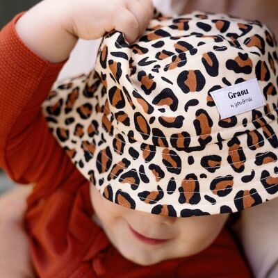 Bebé leopardo de Graou y niño bob