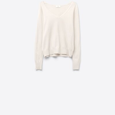 White sweater with V neckline