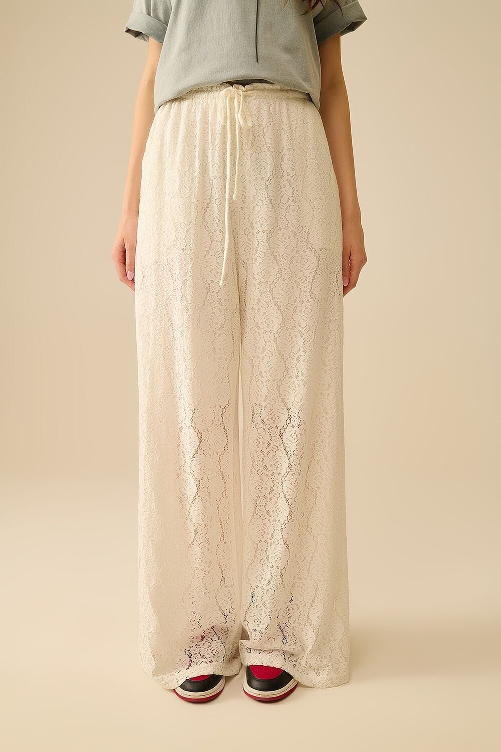 wide-legged lace pants with elastic waistband