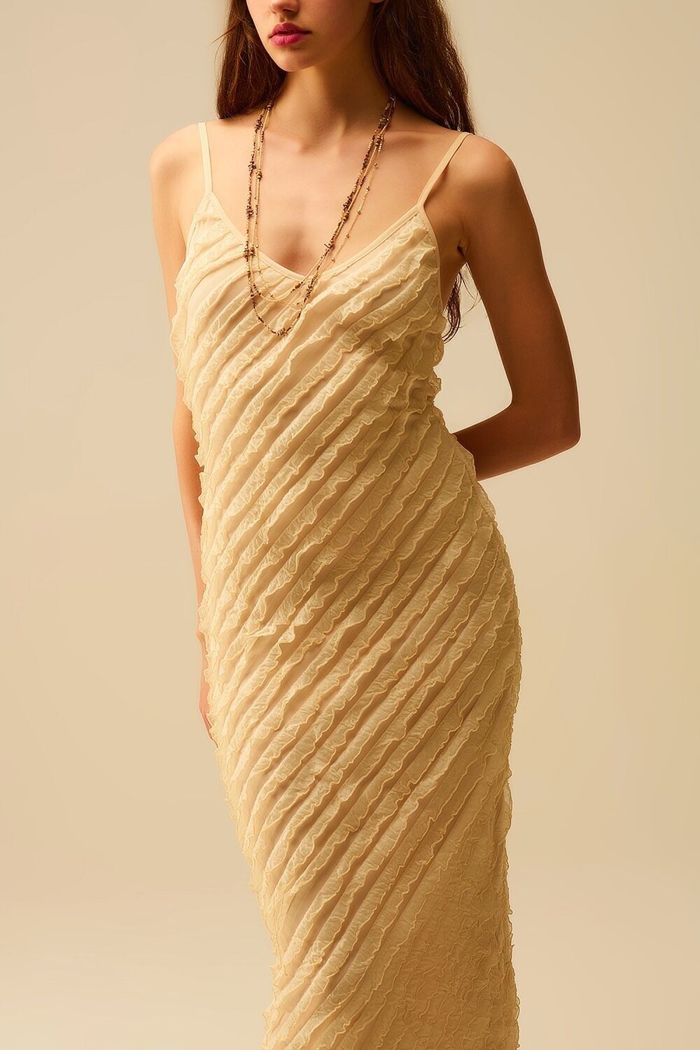 Maxi ecru dress with fringes and straps