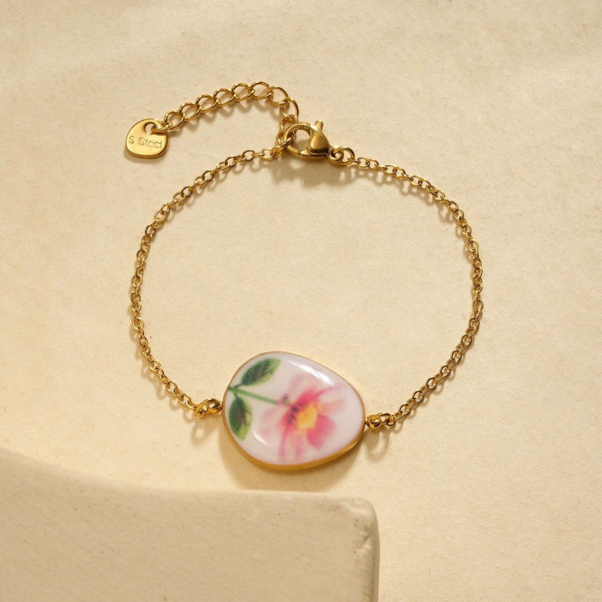 Bracciale a catena fine con fiore disegnato