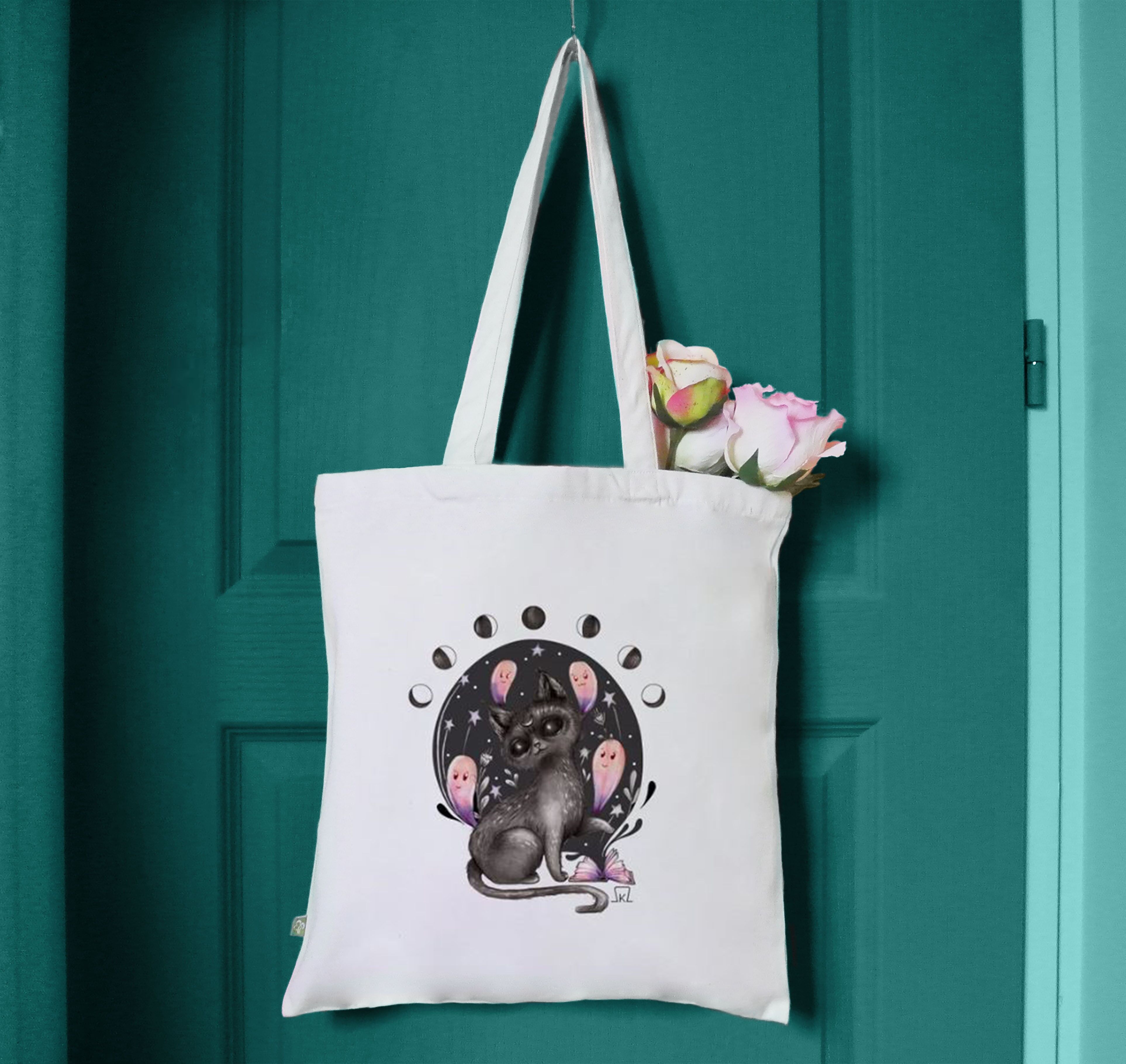 Bolsa de mano ilustrada con gato brujo