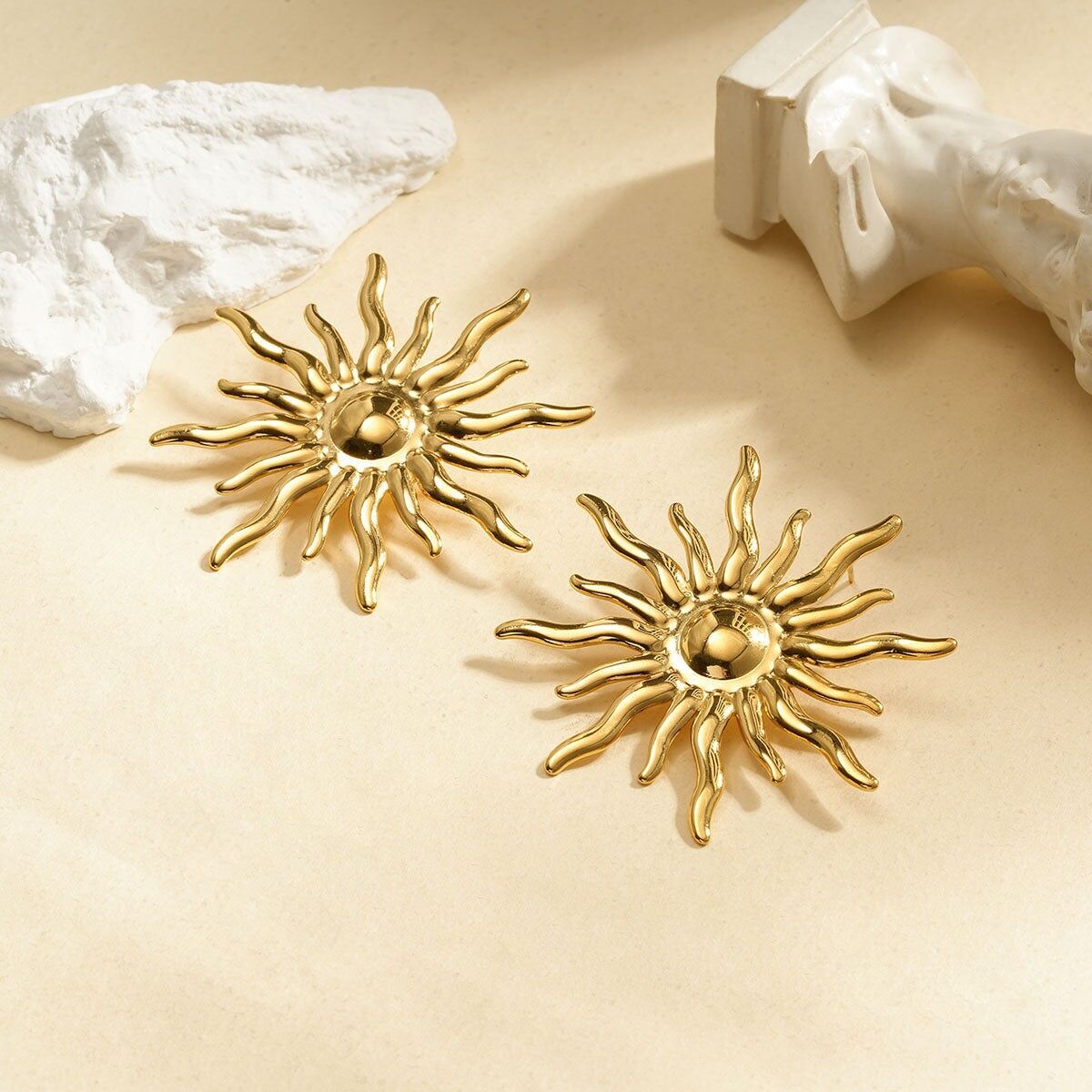 Orecchini sole dorati con raggi