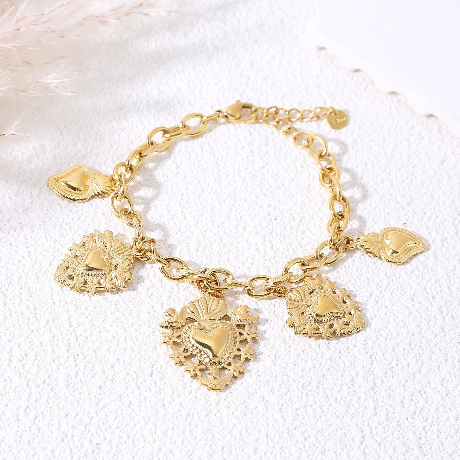 Bracciale dorato con 5 ciondoli ex voto