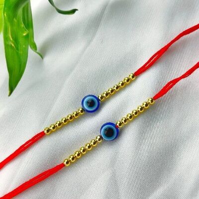 Rakhi mauvais œil en perles dorées pour Raksha Bandhan | Rakhi pour frère et sœur
