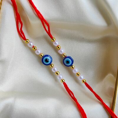 Rakhi con perla bianca e perlina anti-malocchio per Raksha Bandhan | Rakhi personalizzato per fratello
