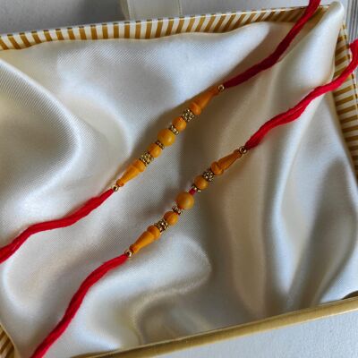 Rakhi con perline arancioni per il fratello Raksha Bandhan
