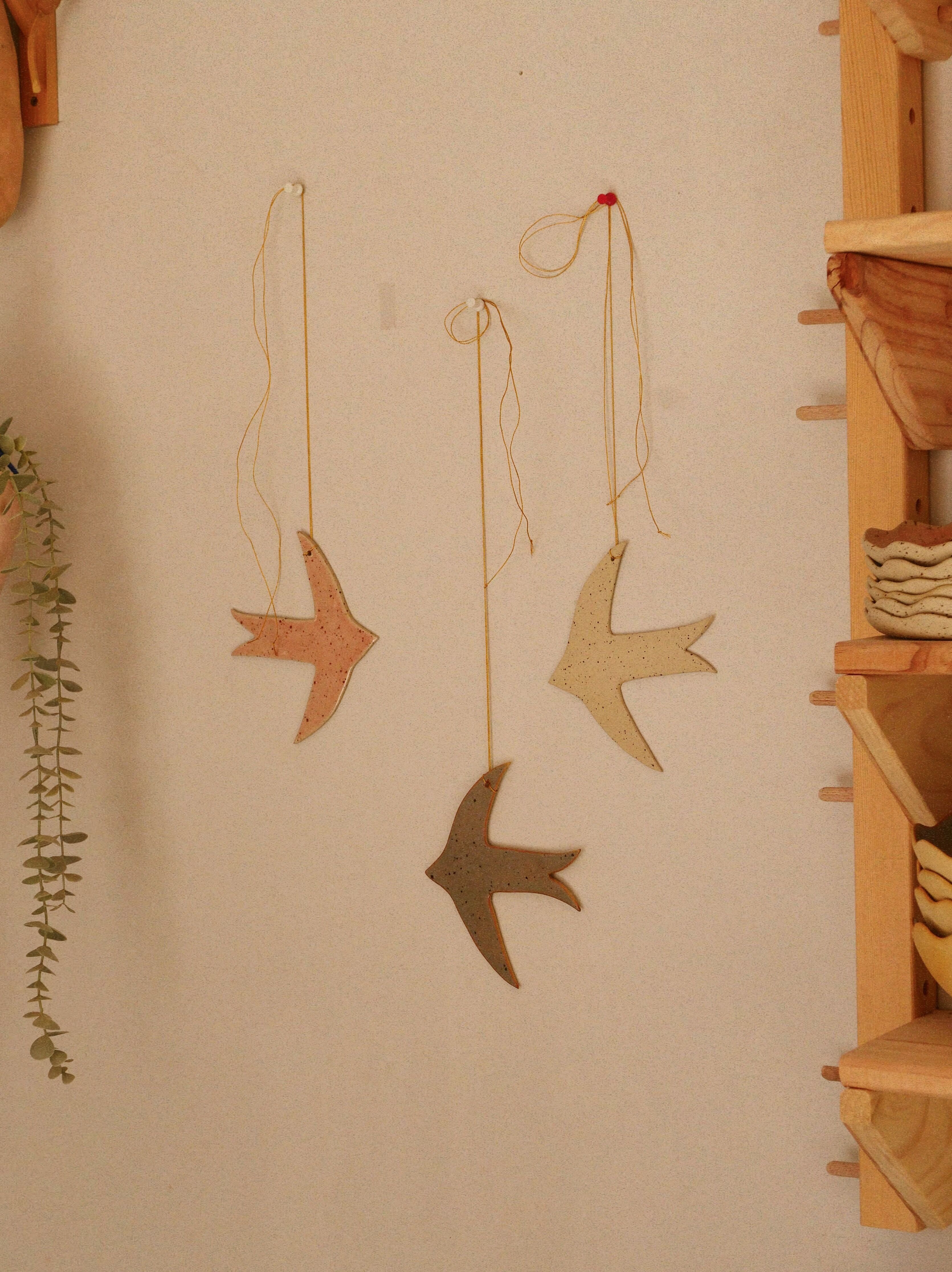 Uccelli in ceramica da parete