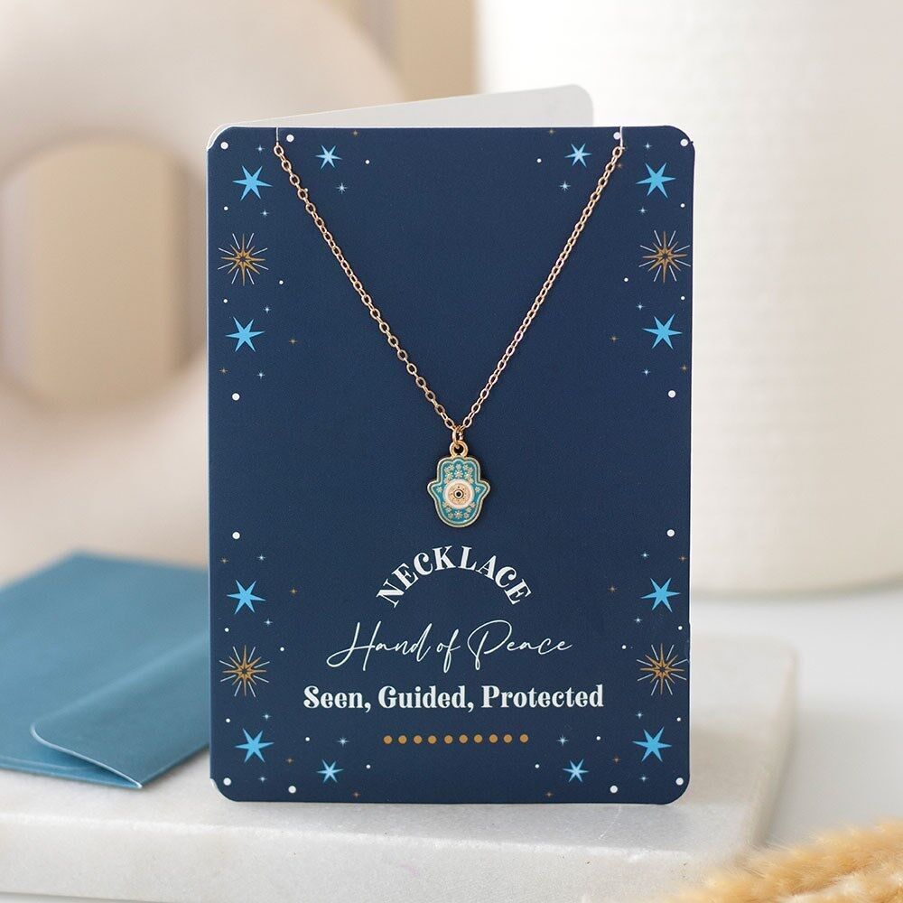 Collana con la mano di Hamsa su biglietto d'auguri