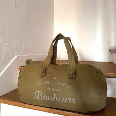Olive green "Happiness Collector" duffel bag