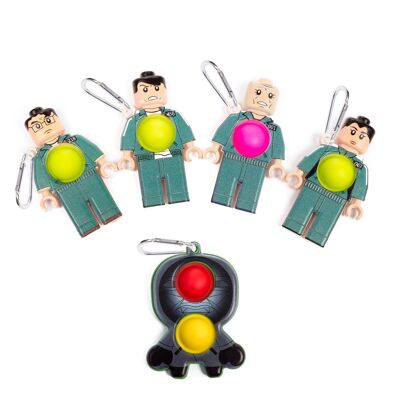 Ensemble de 5 pièces figurines Squid joueurs et leader 9cm. Figurines avec mousqueton et Bubble Pop It central.