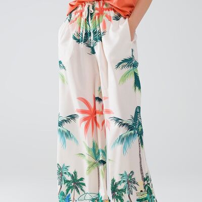Pantalón crema de pierna recta con estampado playero y cintura elástica.