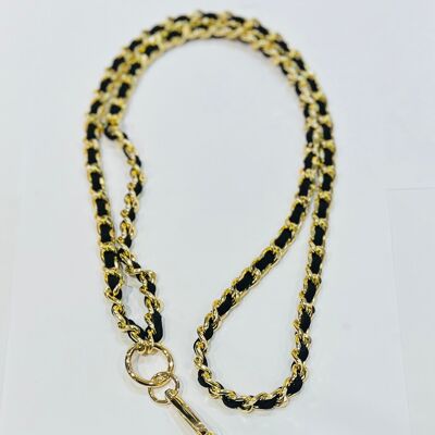 Telephone chain accessory with gold links and black suede