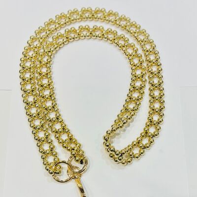 Gold telephone chain accessory with fine ball pattern