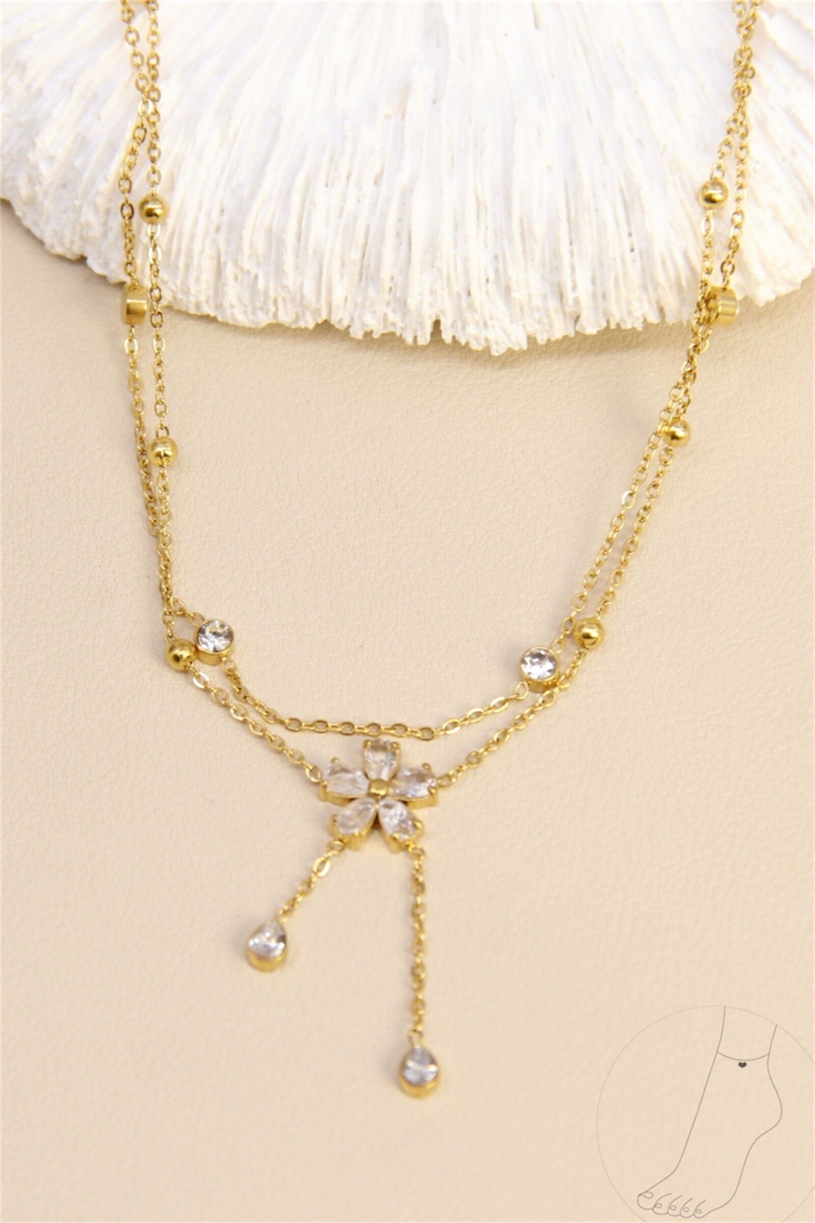 Chaîne de cheville fleur zircon – Élégance en acier inoxydable