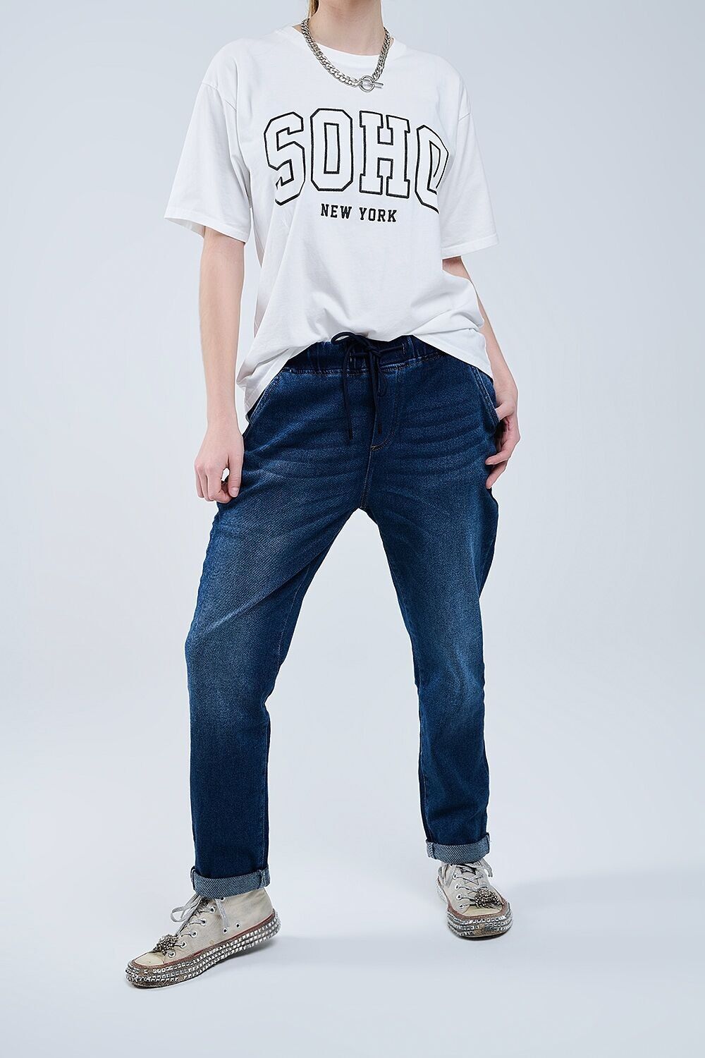 Jeans lavaggio scuro con coulisse e vita elastica