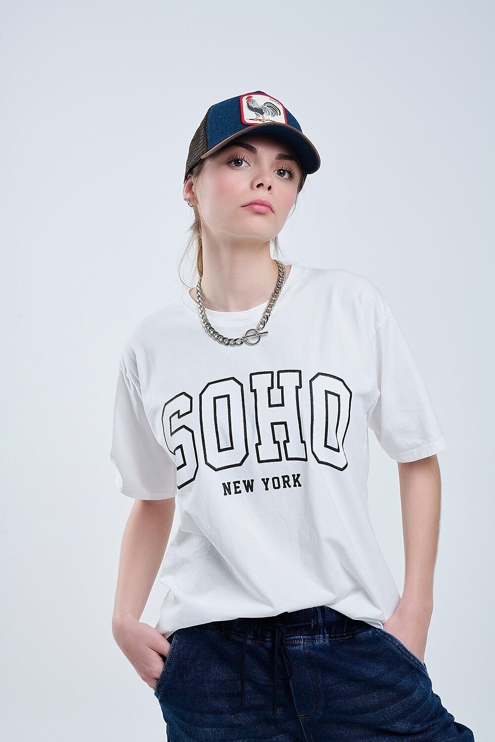T-shirt bianca oversize con Soho New York sul davanti
