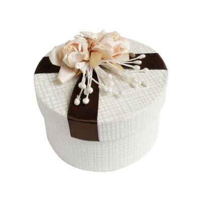 Caja de crema con decoración floral