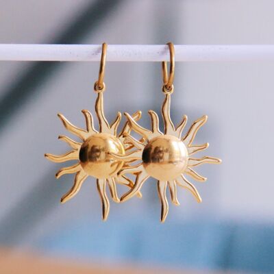 Créole en acier inoxydable avec pendentif soleil