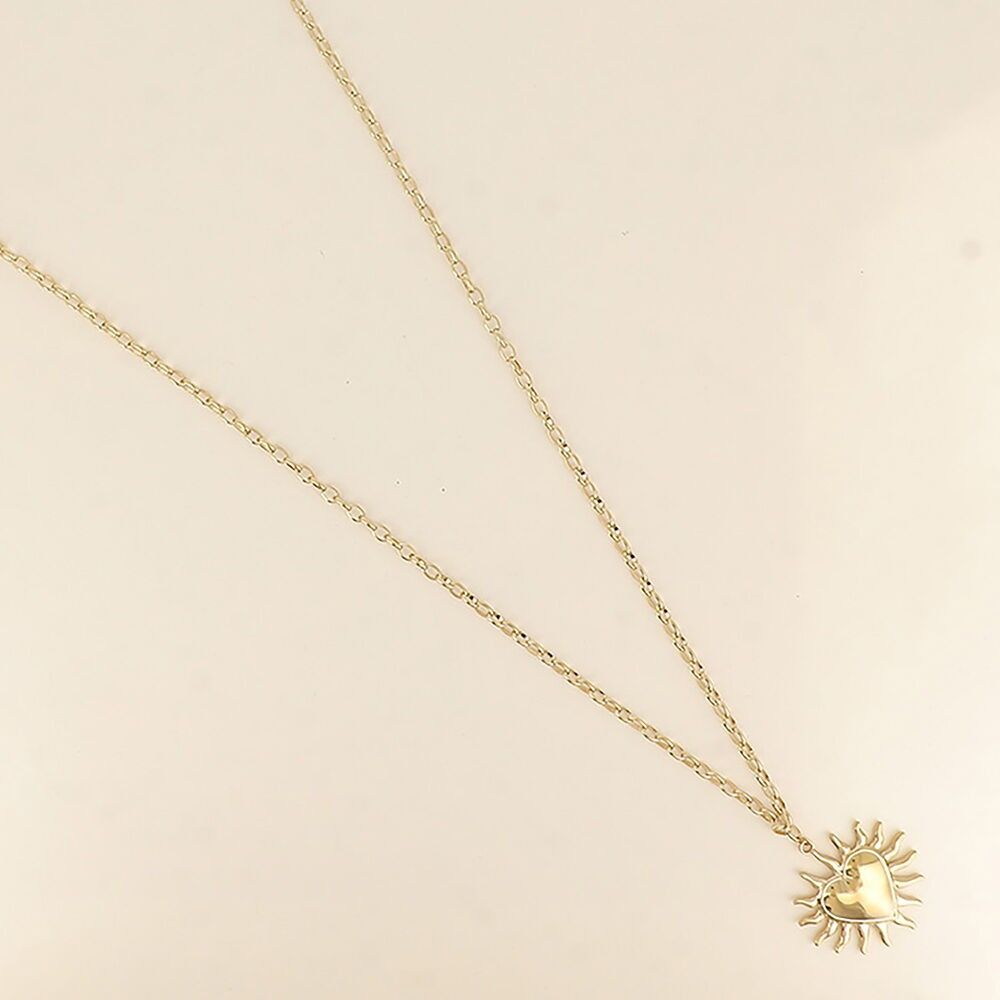 Lange Halskette – großer Sonnenanhänger