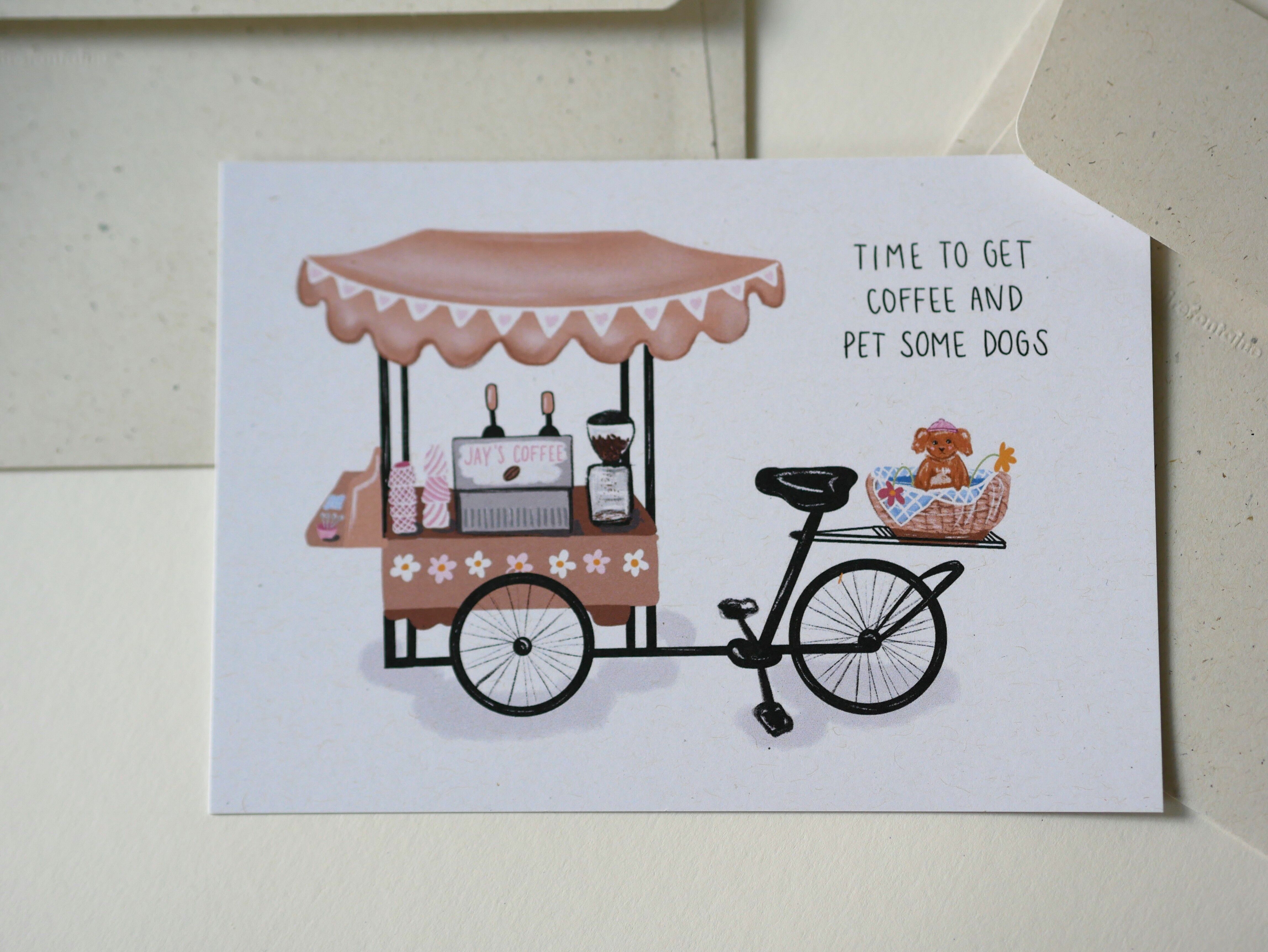 Carte « Café et chiens » – Carte postale peinte à la main sur papier recyclé, représentant un vélo-café avec un chien, avec l'inscription : « Il est temps de prendre un café et de caresser des chiens »