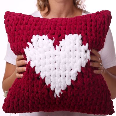 Raspberry hand knit soft cushion, white heart