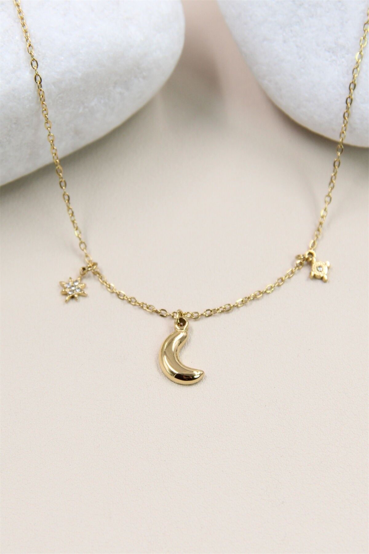 Asymmetrische Mond-Stern-Halskette aus Edelstahl: Stil & Originalität