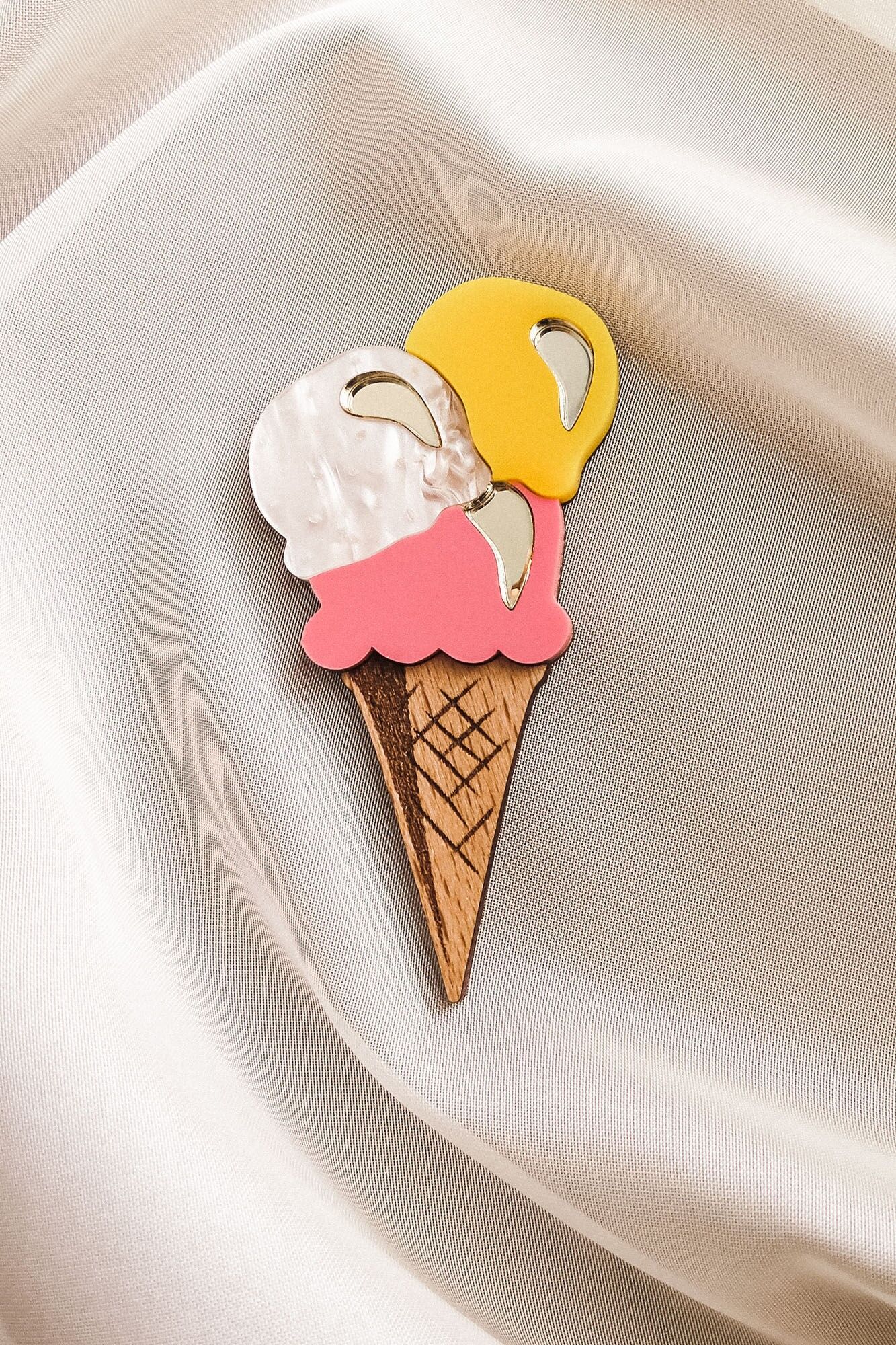 Colorful Ice Cream Brooch with shinny golden highlights laser cut from acrylic glass and plywood