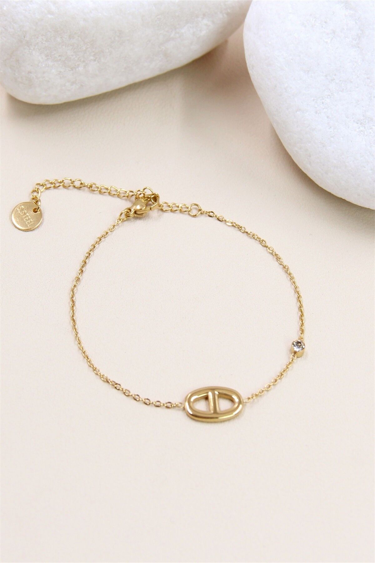 Bracelet motif boucle strass en acier inoxydable : Un bijou de glamour