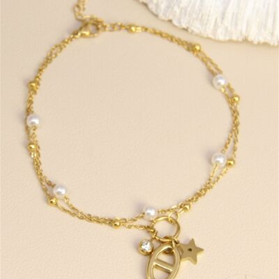Chaîne de cheville double dorée – Perles blanches & charms tendance