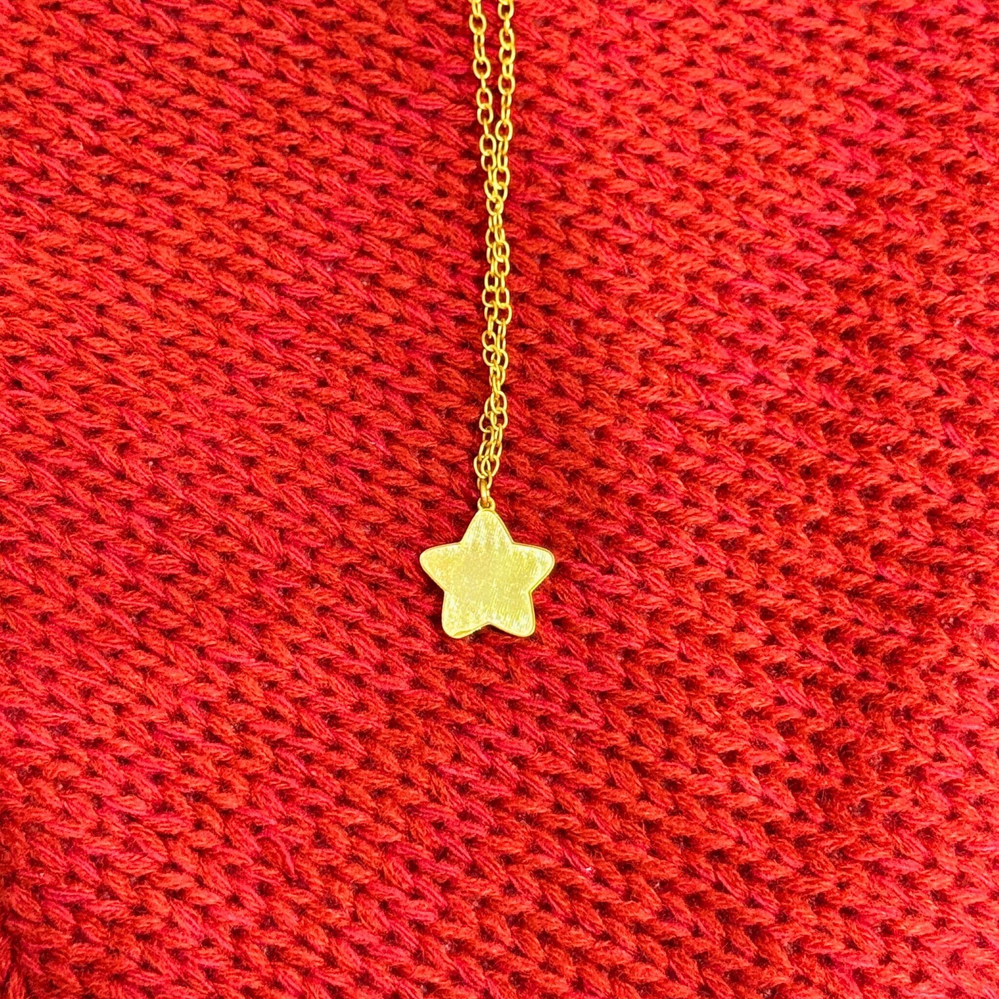 Collana con ciondolo a stella morbida - Oro