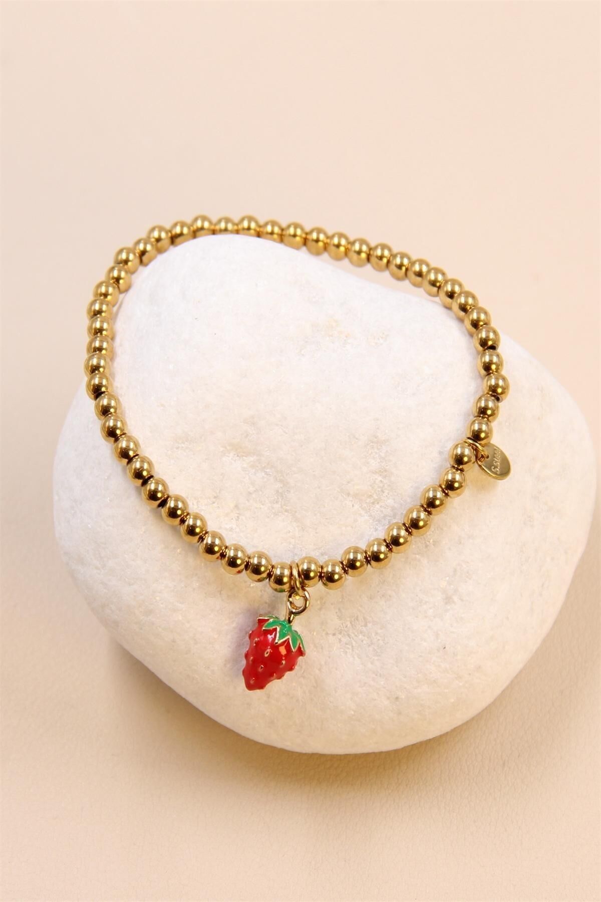 Bracelet élastique fraise en acier inoxydable : une pépite de style