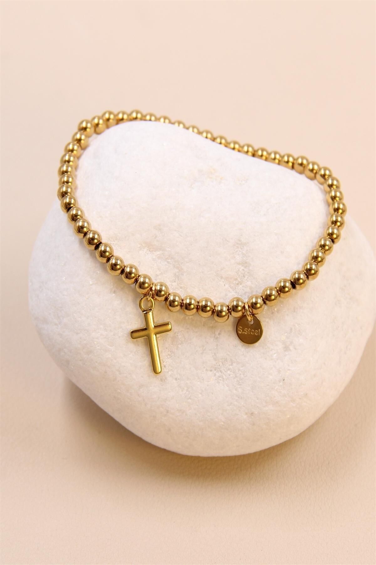 Bracelet élastique croix en acier inoxydable : une déclaration spirituelle